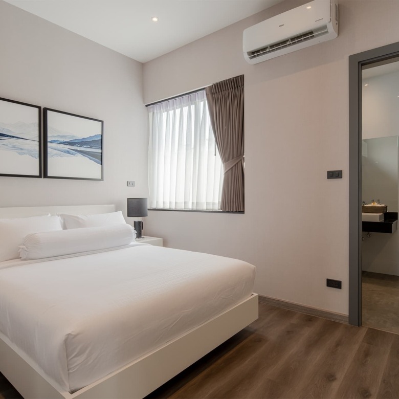 Modern bedroom inside a luxury home for sale in Chiang Mai