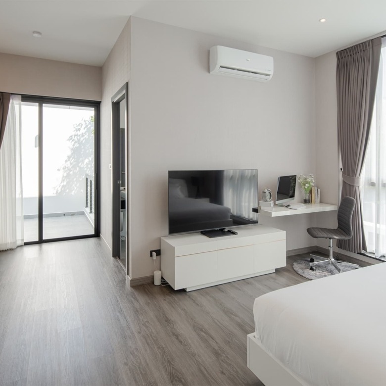 Modern bedroom inside a luxury home for sale in Chiang Mai