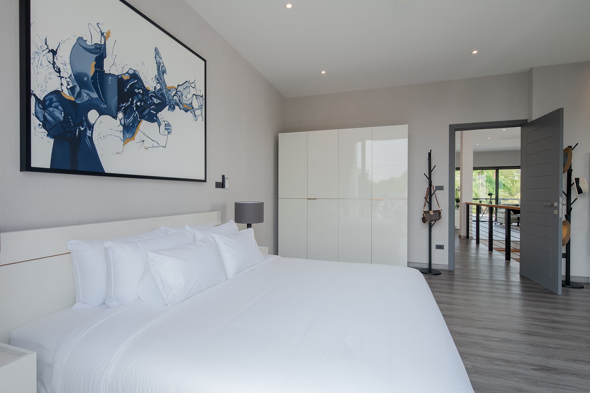Modern bedroom inside a luxury home for sale in Chiang Mai